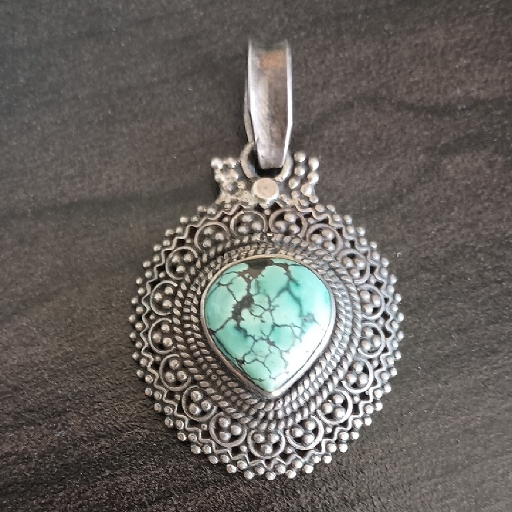 Tibetan Silver And Turquoise Pendant